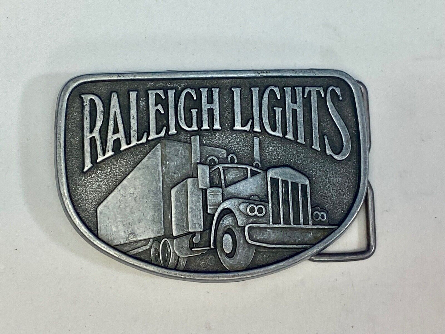 Vintage Belt Buckle Raleigh Lights Cigarette Trucker Trucking Cigarettes
