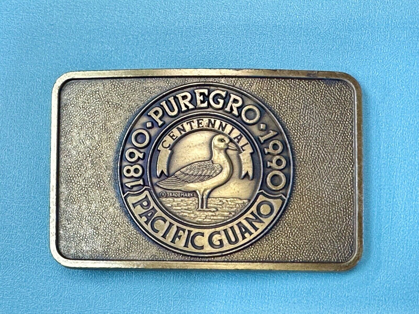 1990 Puregro Pacific Guano Centennial Celebration vintage belt buckle