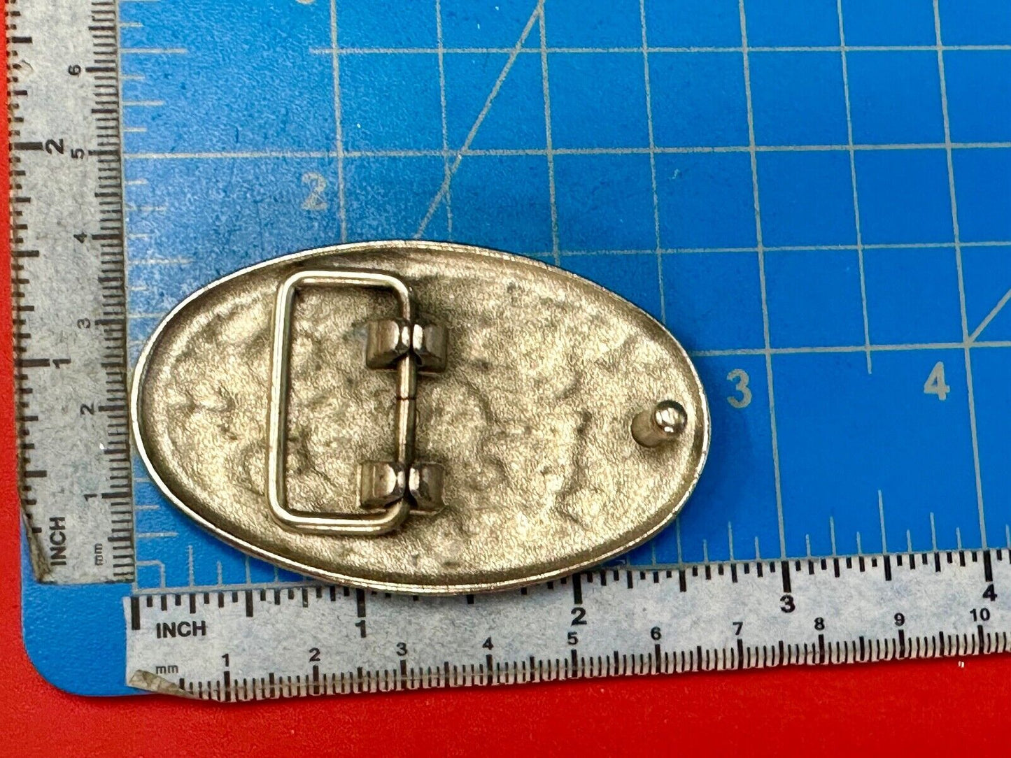 Vintage Cluster Centered in southwestern pattern oval belt buckle