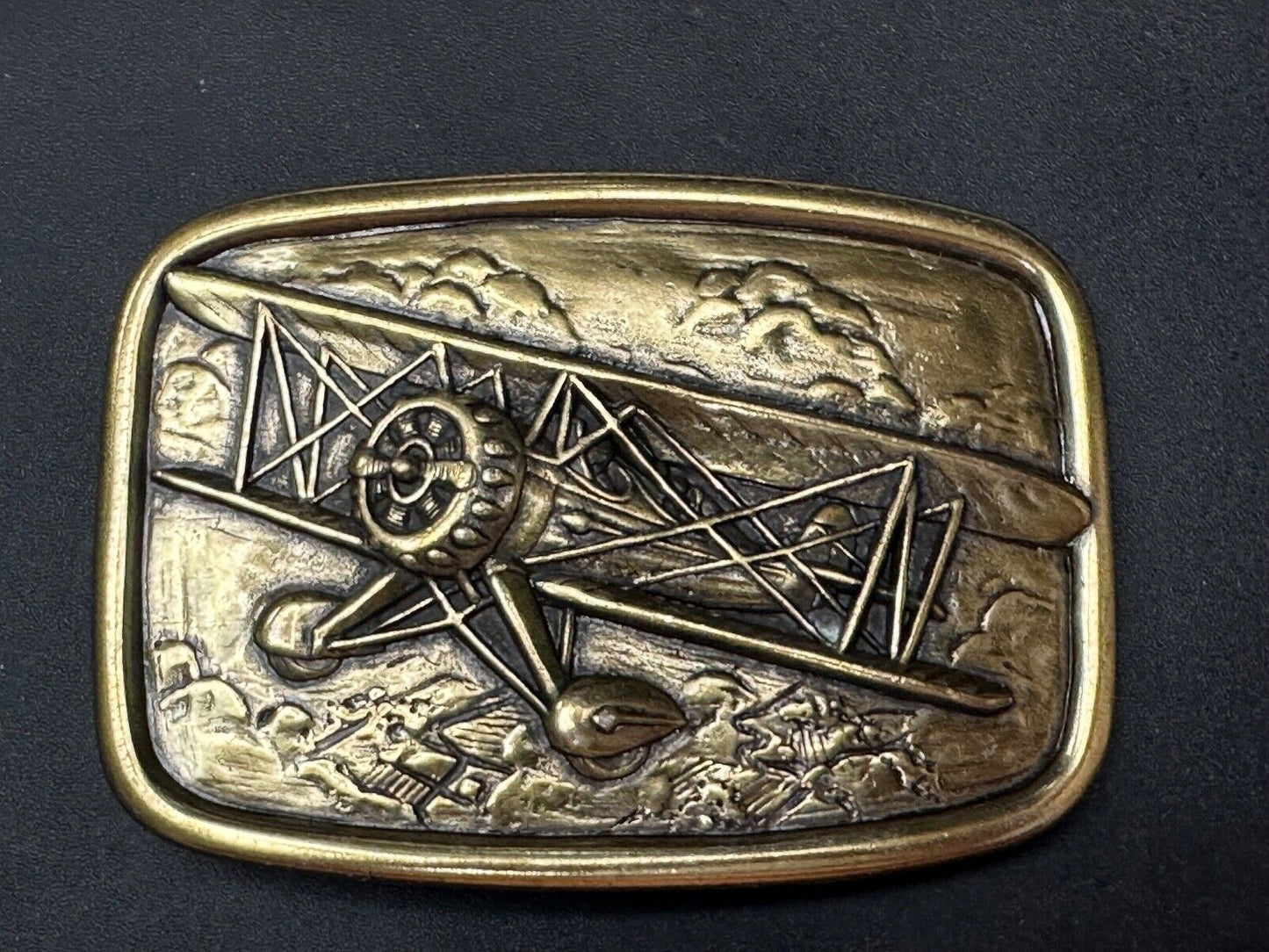 Bi-Plane Pilots Airplane brass tone Belt Buckle by Avon