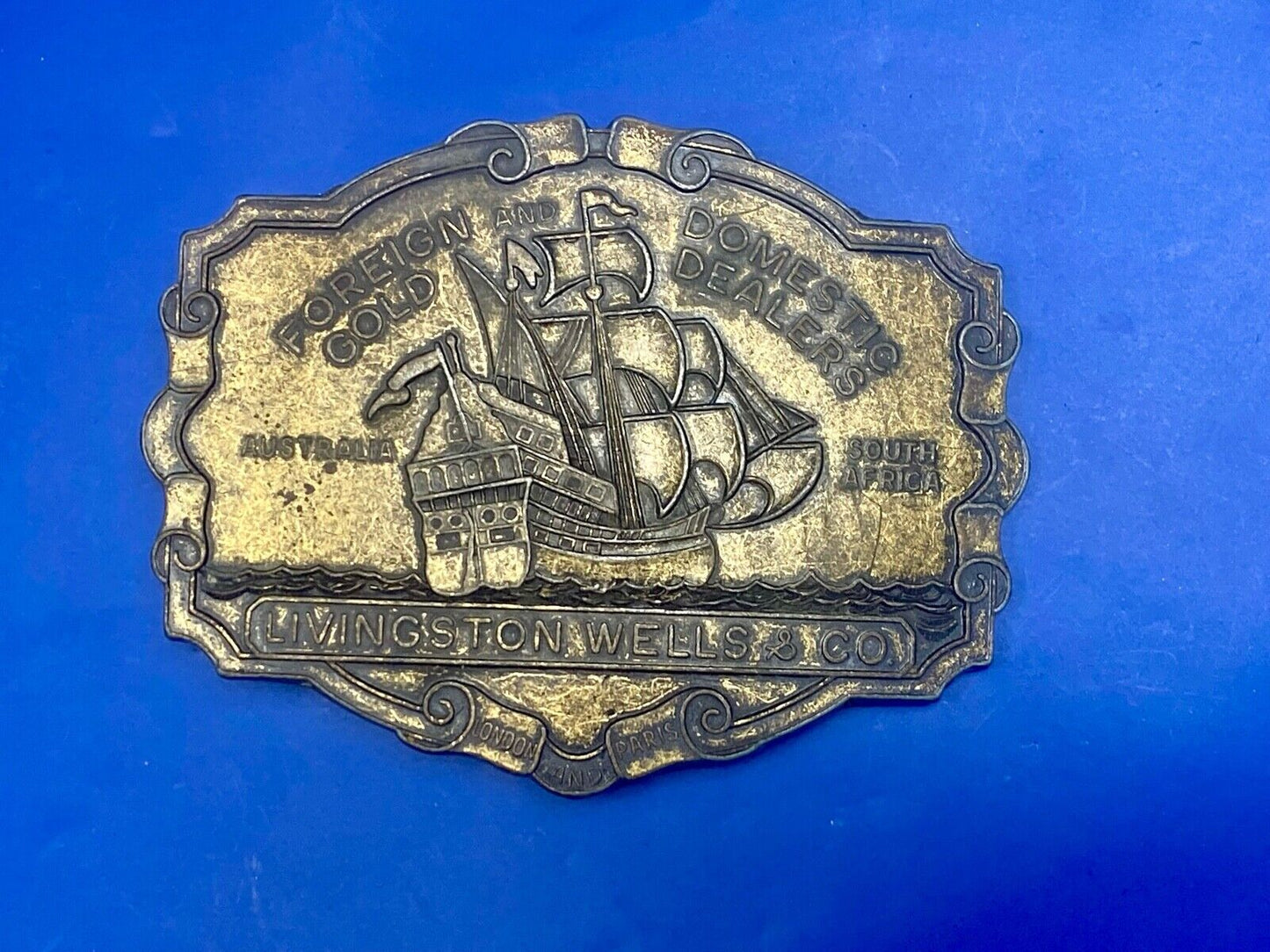VINTAGE ANTIQUE METAL BELT BUCKLE- Livingston Wells & Co Sailboat Ship