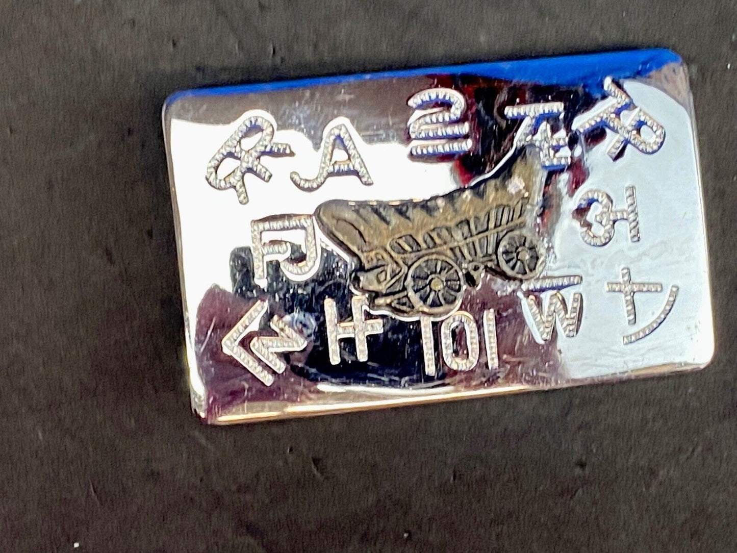 Vintage Chaimbers covered wagon western belt buckle with branding signs marks