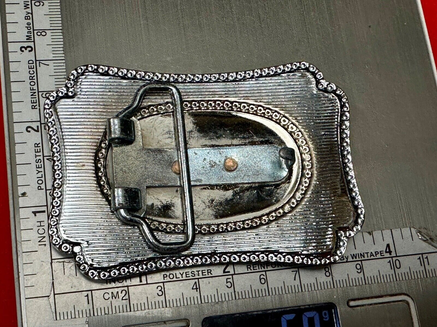 Vintage covered wagon western horse drawn transportation belt buckle