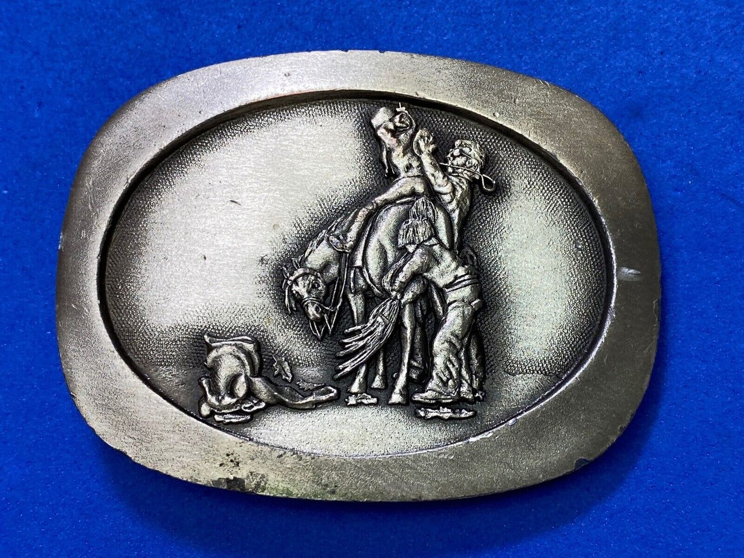 Teaching Future Rodeo Cowboys Grooming Belt Buckle Art Unique And Unknown To Me!