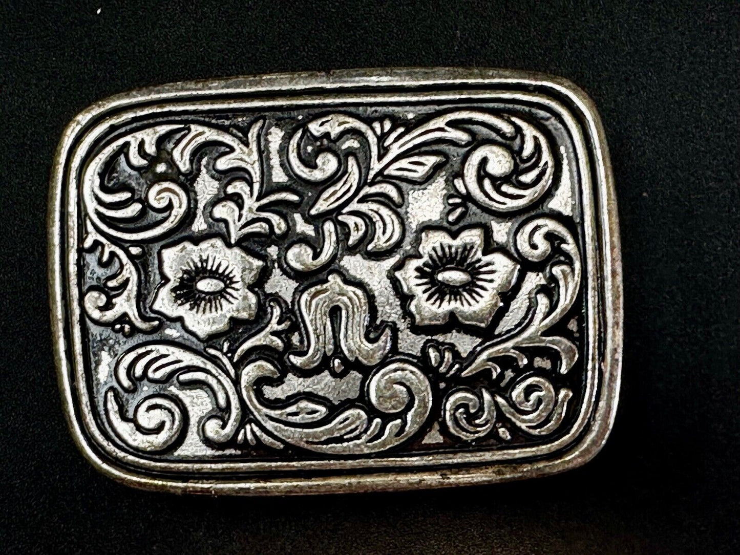 Vintage black and silver tone western flower floral theme cowboys belt buckle