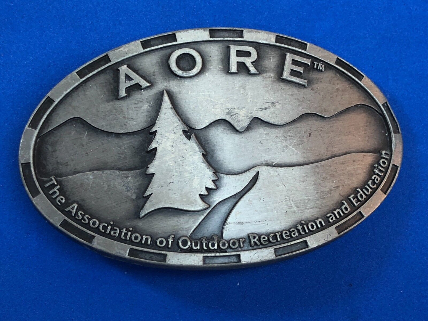 AORE Assn of outdoor Recreation and Education belt buckle