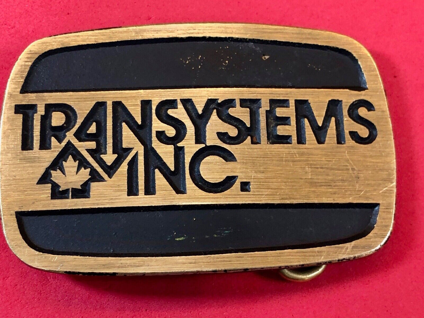 transystems inc Canada Promo belt buckle -a Construction engineering company