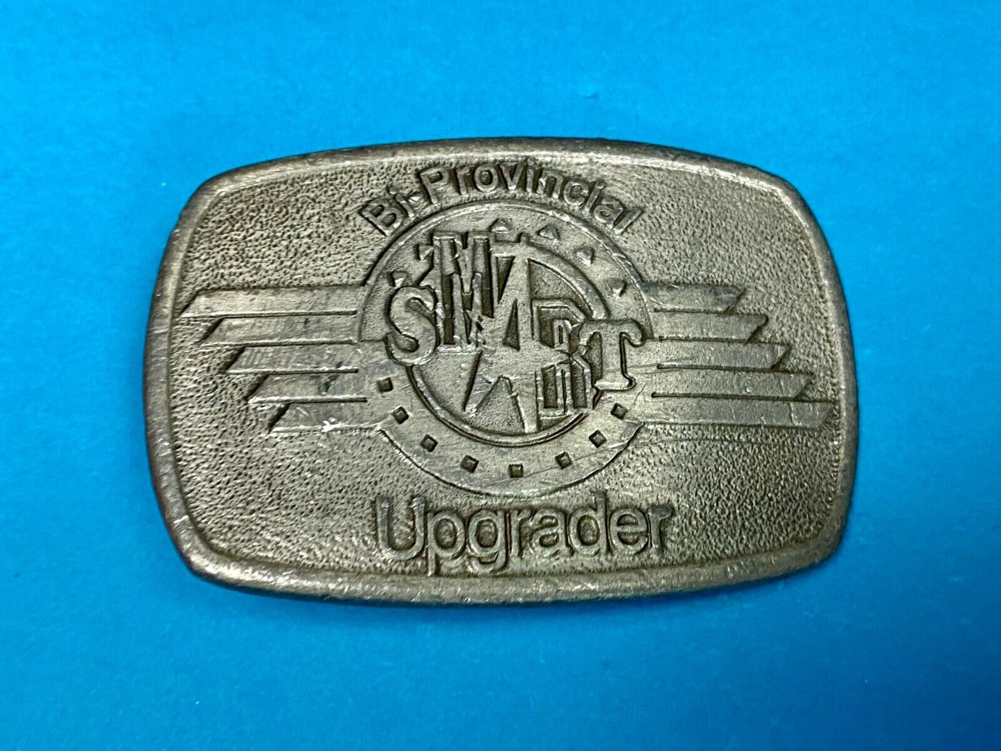 Bi-Provincial Smart Sm Art Upgrader Belt Buckle By Ad Ventures Studios