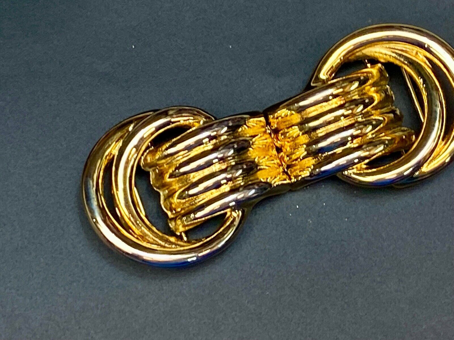 Vintage 2- piece interlocking dual knot ring pattern belt buckle by Dotty Smith