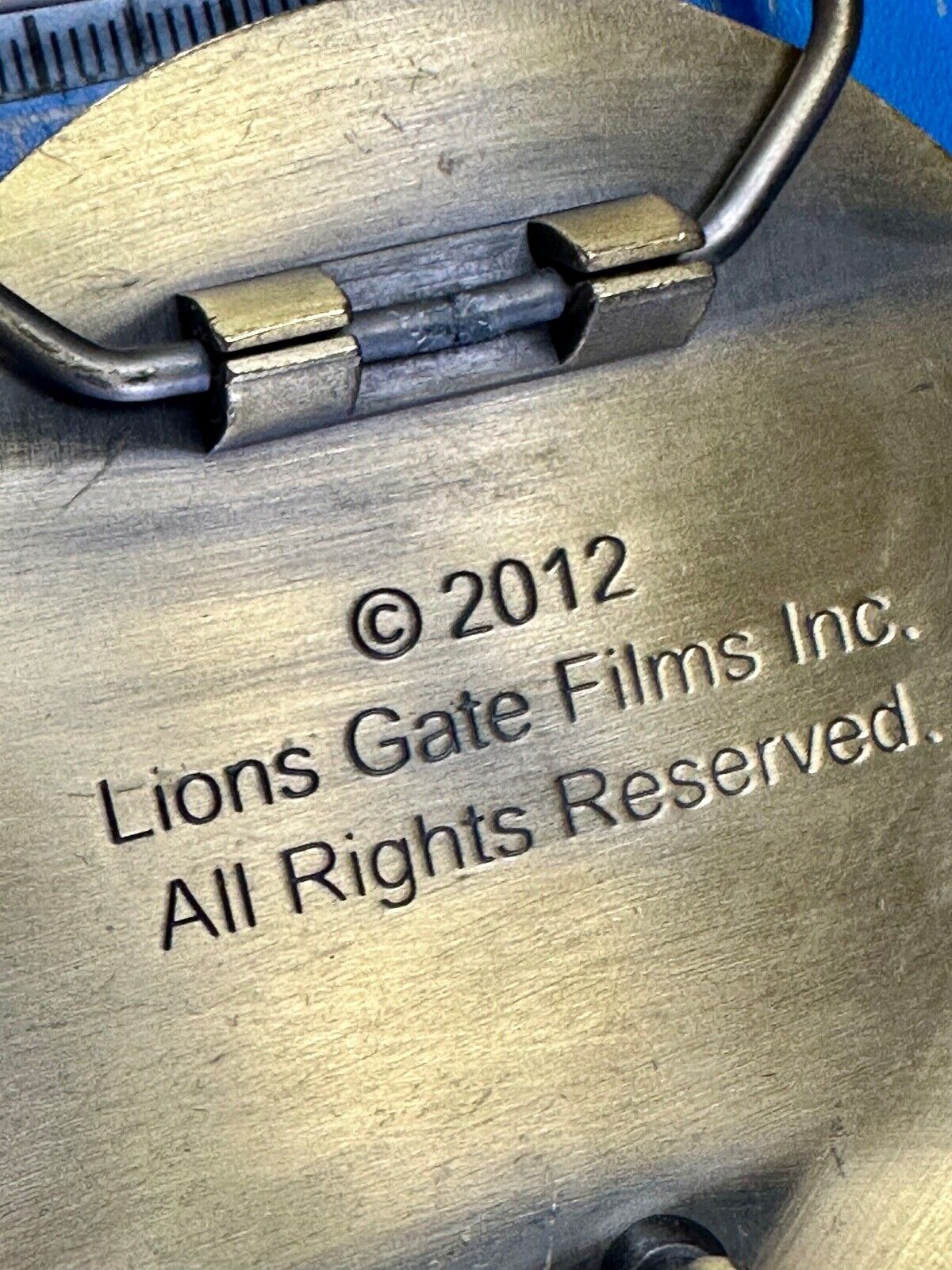 The Hunger Games, District 12 Tribute - Movie Book Emblem belt buckle