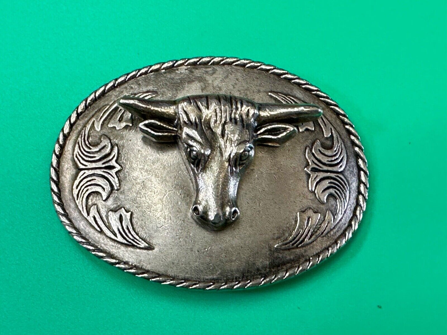 The Longhorn cow steer - cowboys cowgirls western oval silver tone belt buckle