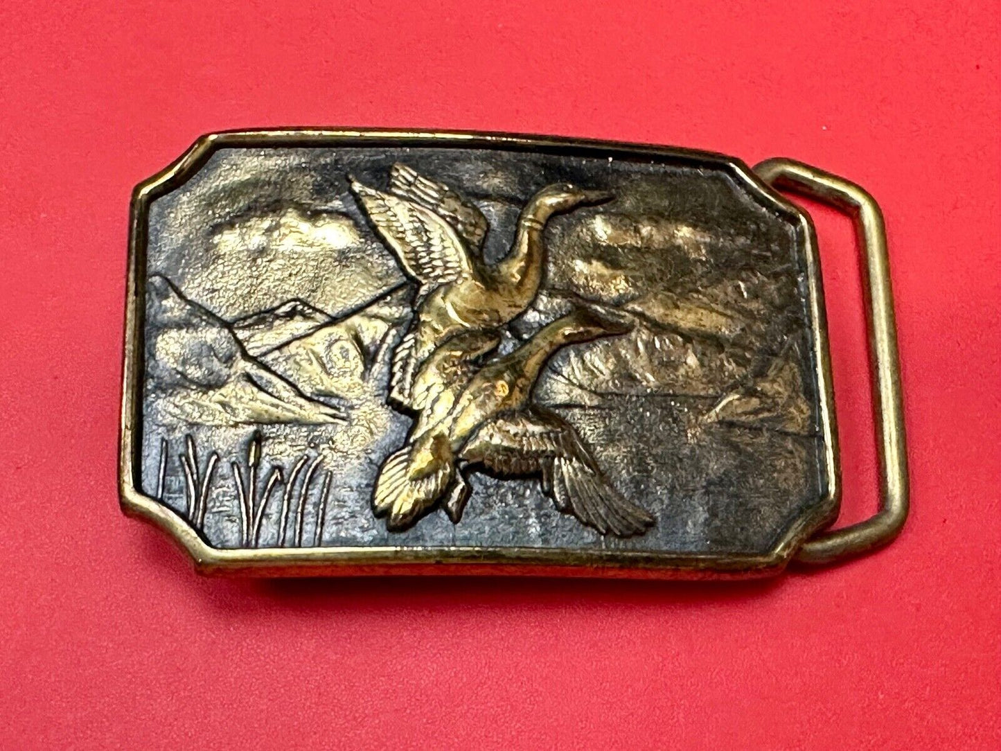 Two ducks flying from pond cat tails Nature Solid Brass belt buckle by BTS