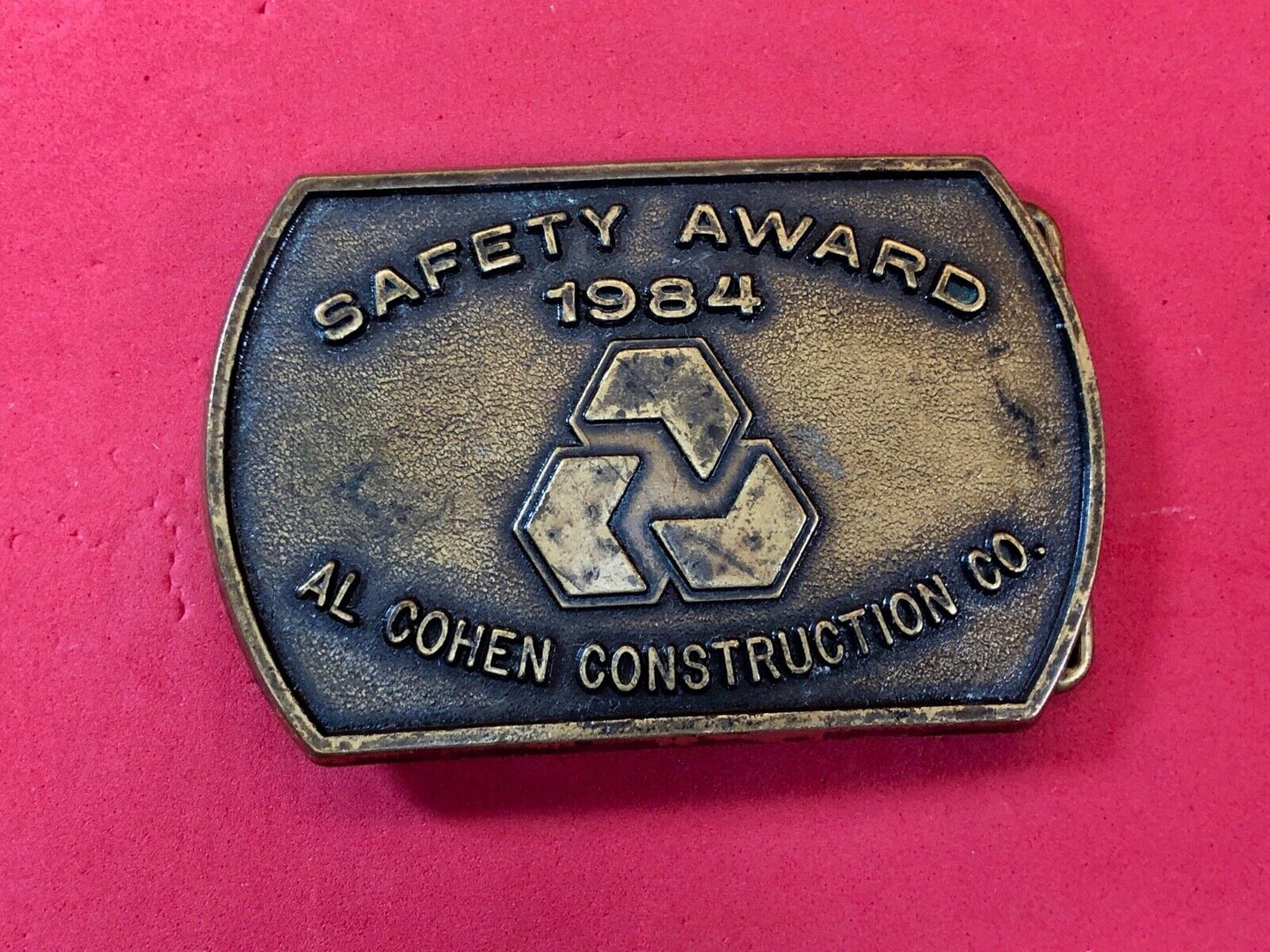 Vintage 1984 AL Cohen Construction Company promotional belt buckle safety award