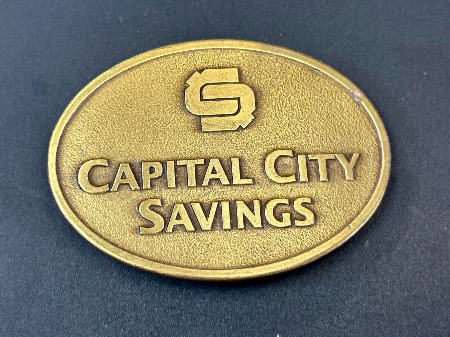 Vintage Capitol City Savings Bank Promo Advertising belt buckle by Magnum Opus