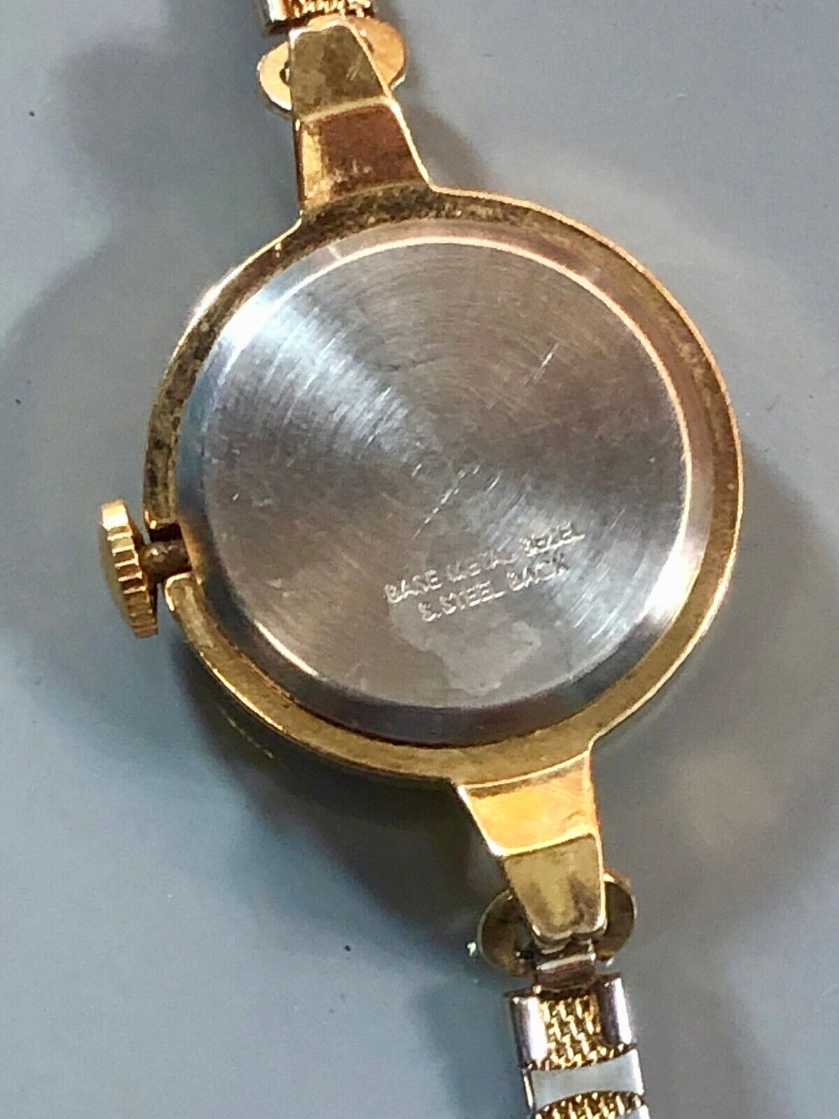 Timex Vintage Gold tone Disc Circular retro woman’s wind up watch