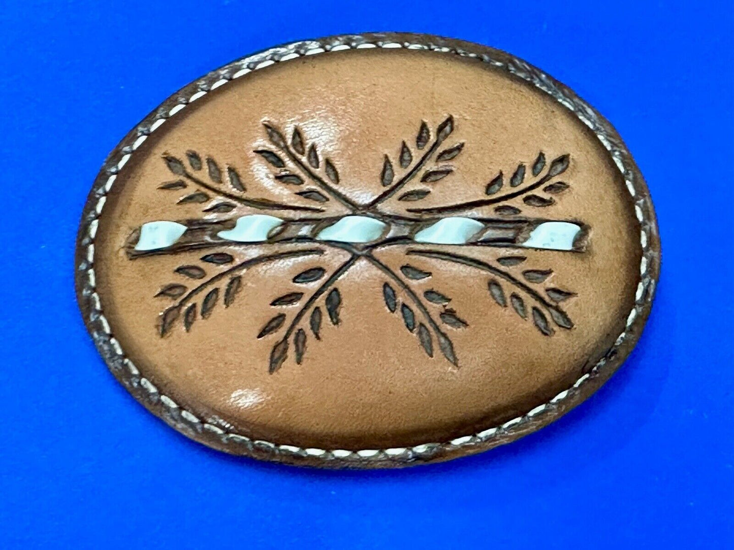 Beautiful Leather Factors Western oval mixed color / tooled Belt Buckle