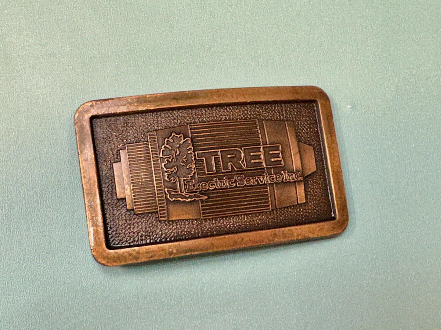Tree electric service INC Vintage advertising promo brass tone Belt Buckle
