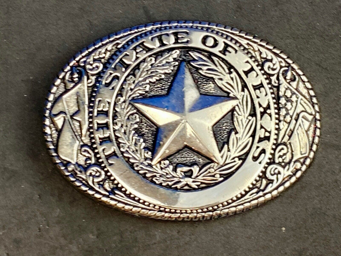 THE GREAT STATE OF TEXAS Star Black and Silver color flower swirl belt buckle