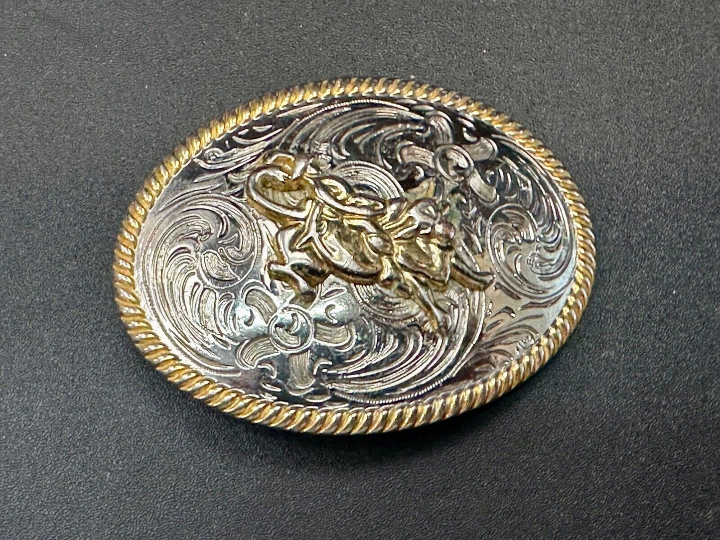 2.5" wide Two tone Vintage western rodeo cowboy belt buckle.