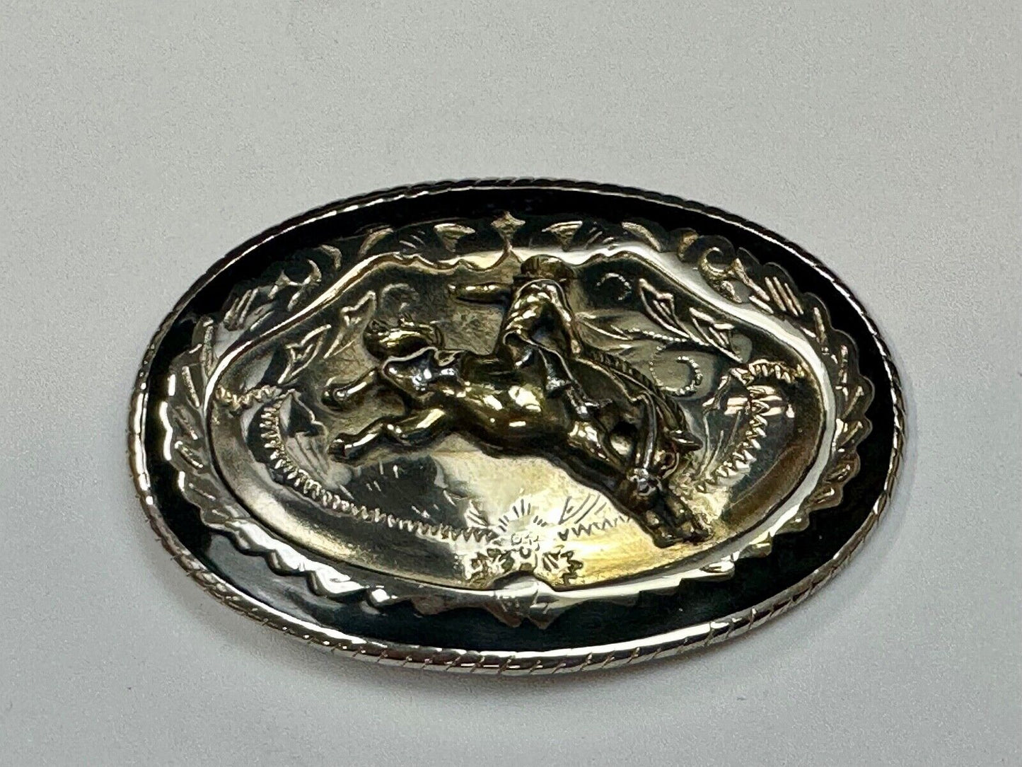 Beautiful Cowboy Saddle Bronc western black silver gold color belt buckle