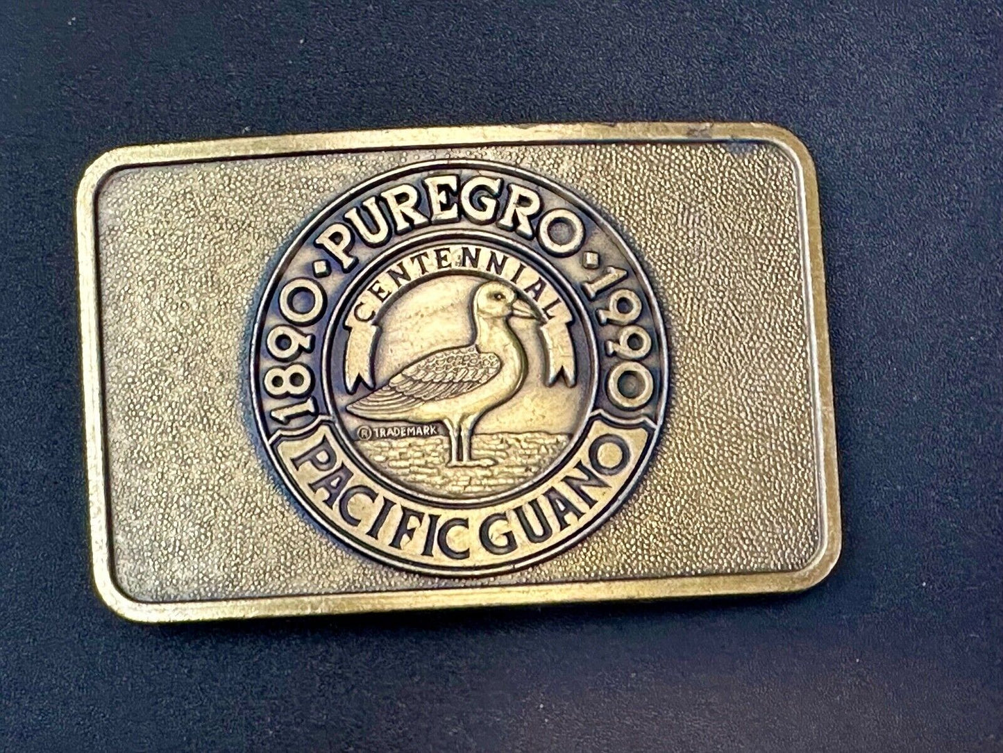 1990 Puregro Pacific Guano Centennial Celebration vintage belt buckle