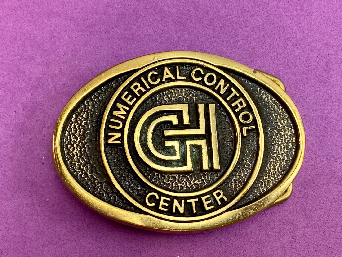 Vintage GH Numerical Control Center solid brass belt buckle by Blue Bayou