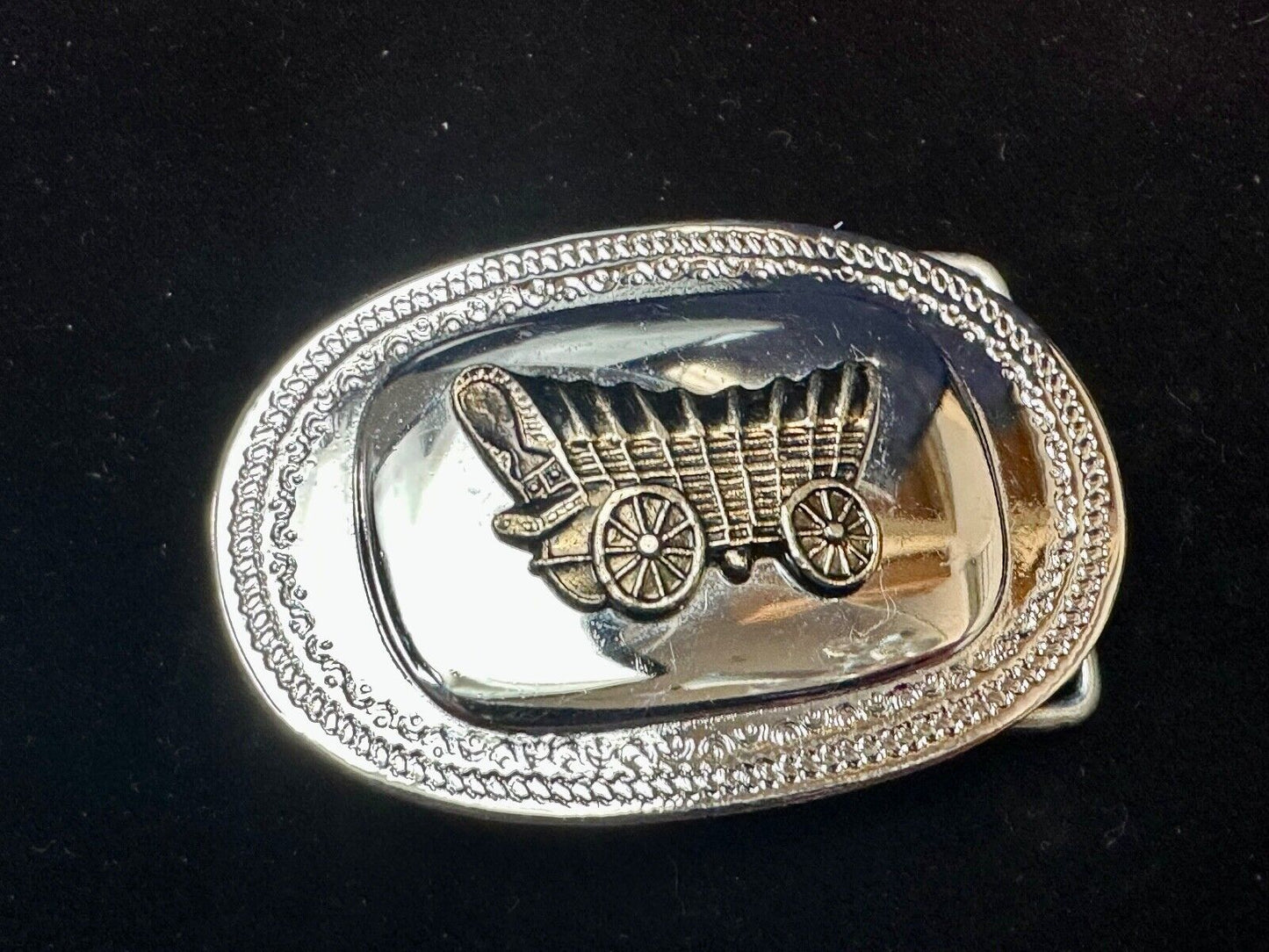 Vintage Covered Wagon on reflective oval two tone western belt buckle