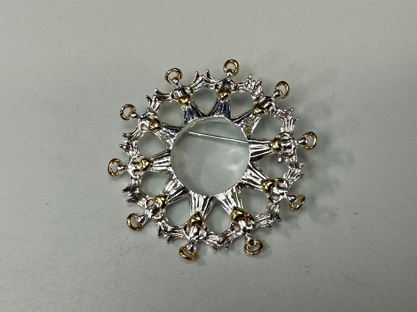Angles in Circular pattern holiday wreath Avon signed vintage brooch pin