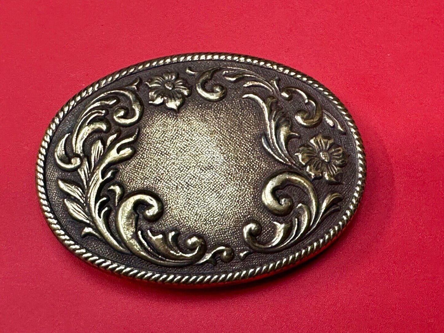 USA made vintage western flower swirl design oval belt buckle marked W