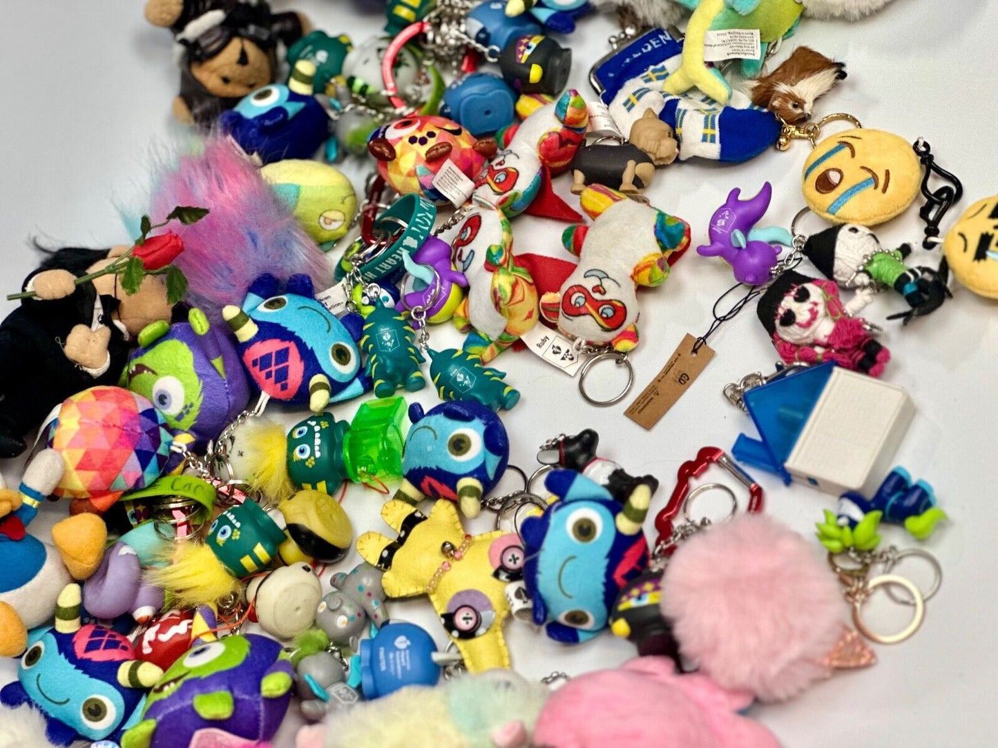 Around 75 plush doll Keychains Resale Bulk Lot, Junk Drawer Grab Bag