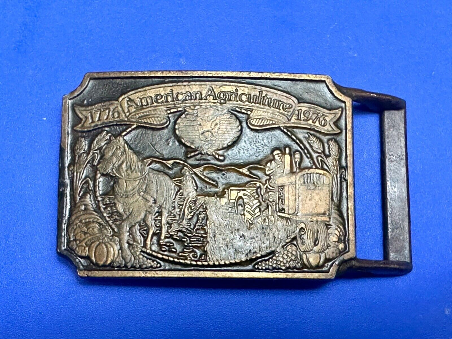 Bicentennial American Agriculture Horse to tractor, Vtg belt buckle by Ortho