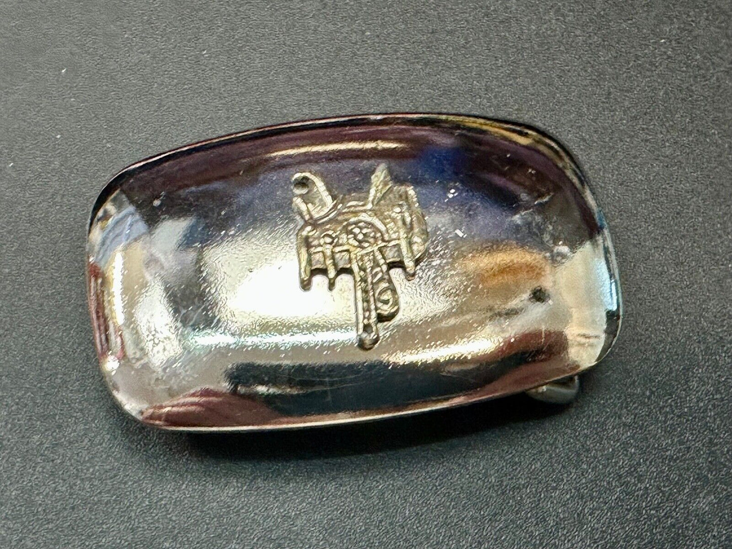 Beautiful two tone Horse Saddle on reflective western belt buckle