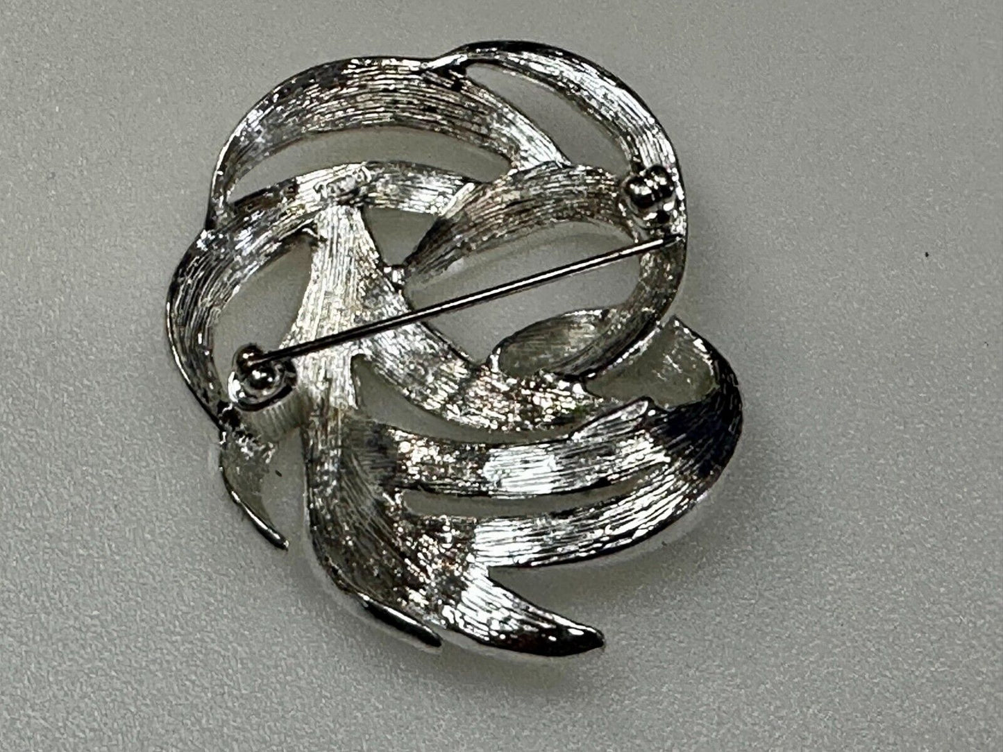 Swirled Curled Silver Tone Vintage Brooch Pin Signed Monet