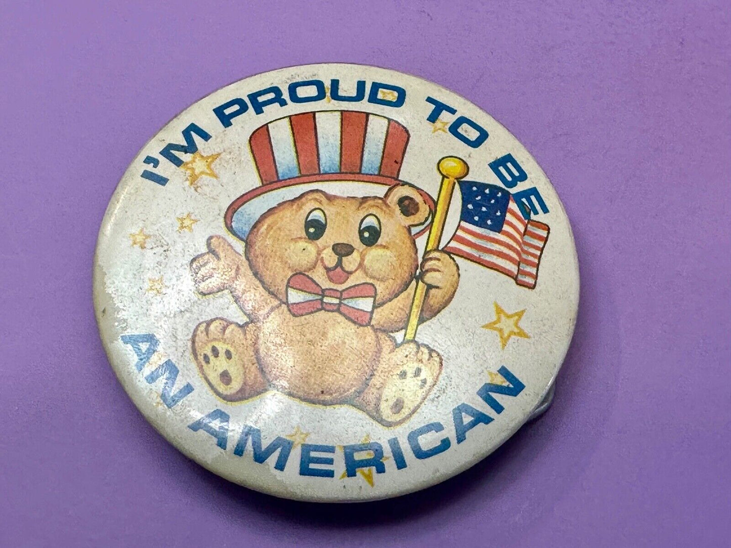Teddy Bear Holding Flag, Proud To Be An American Artisan Button into Belt Buckle
