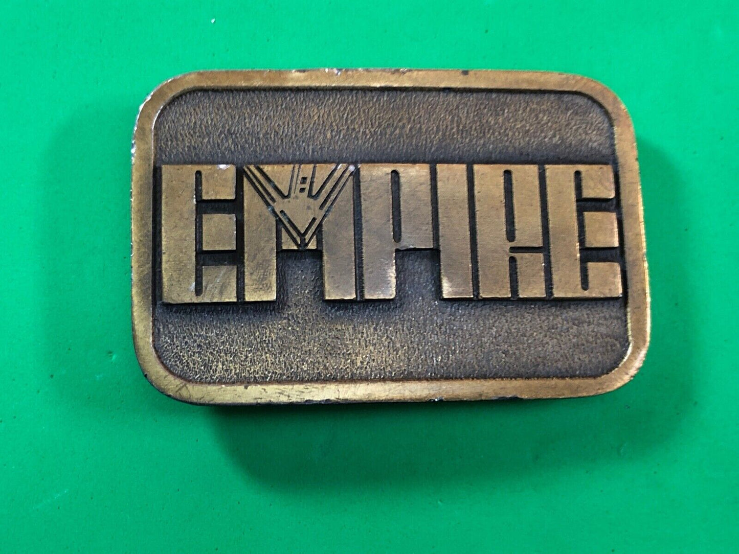 Vintage Empire Belt Buckle signed FEMA 1984