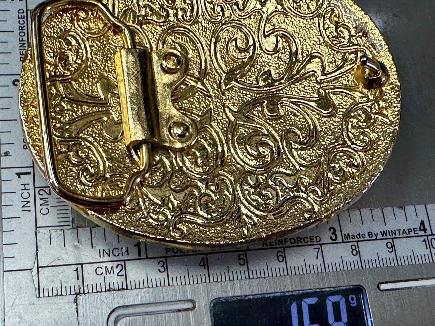 Beautiful chunky goldtone flower centerpiece in rhinestone accented belt buckle