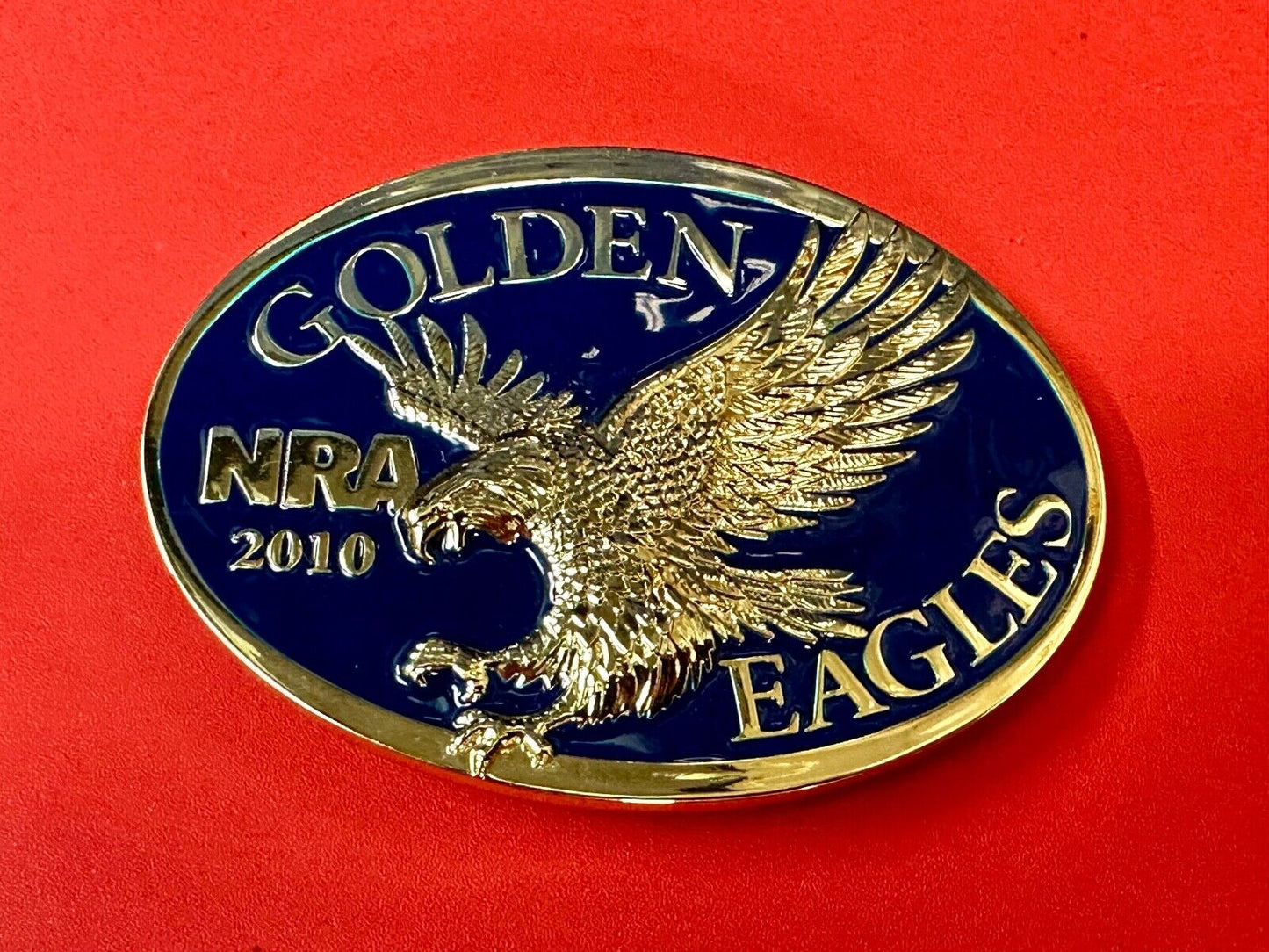 2010 NRA National Rifle Association Golden Eagle blue ribbon belt buckle in box