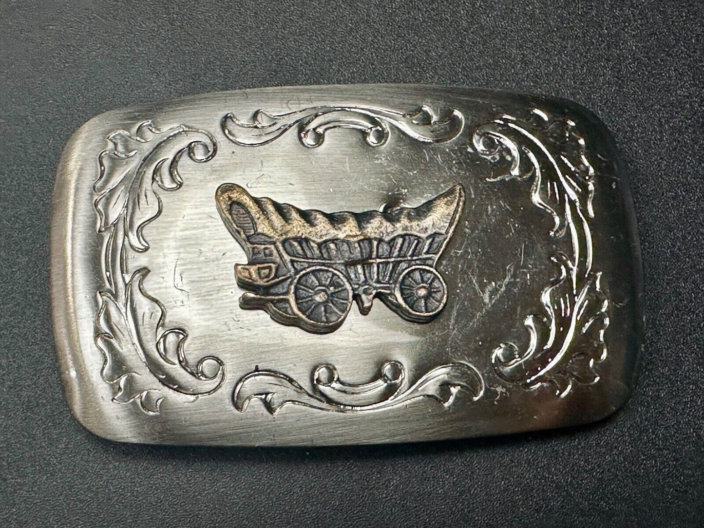 Vintage covered wagon two tone western mixed metal belt buckle