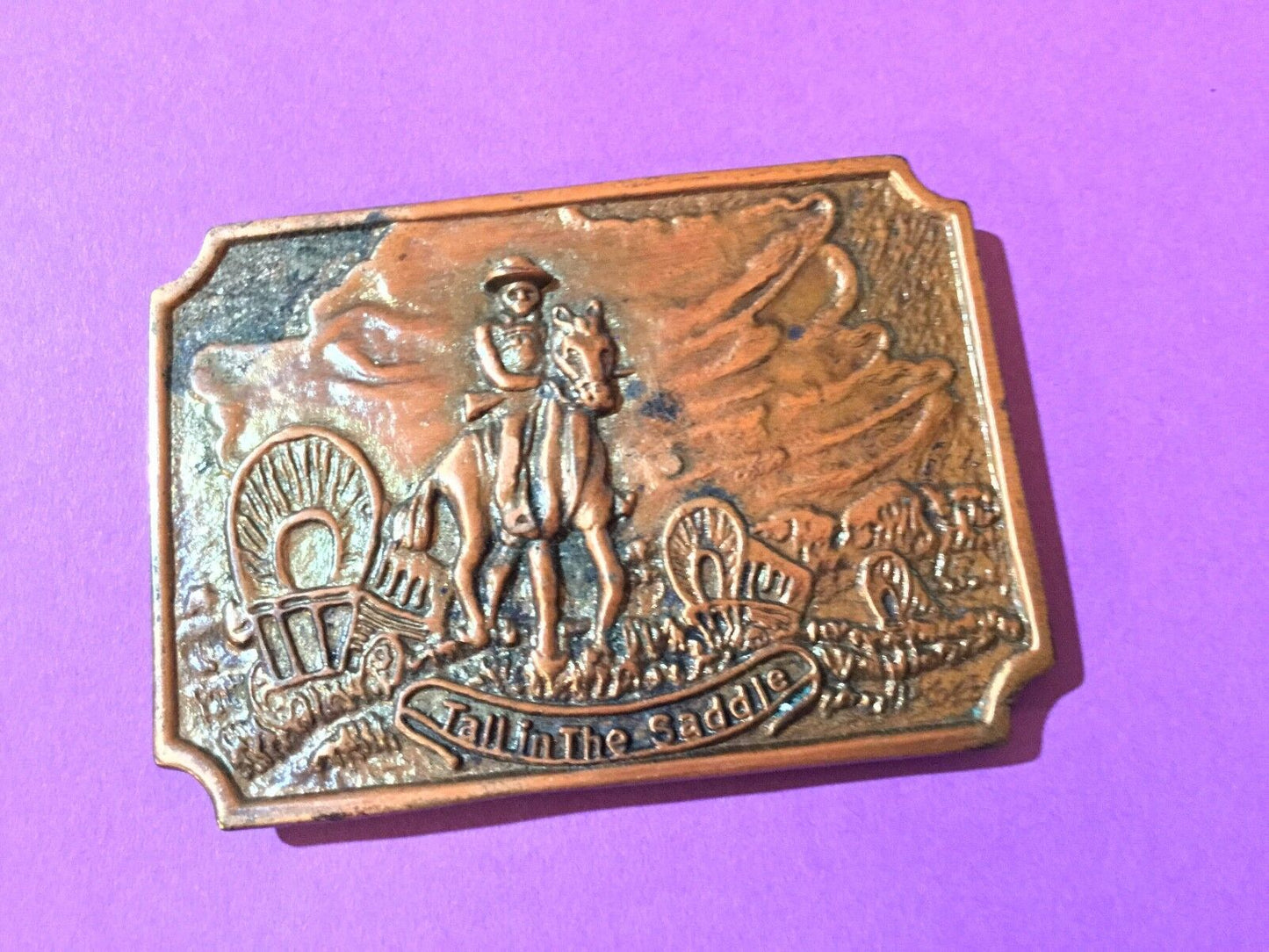 Tall in the saddle belt buckle - covered wagon - out west belt buckle