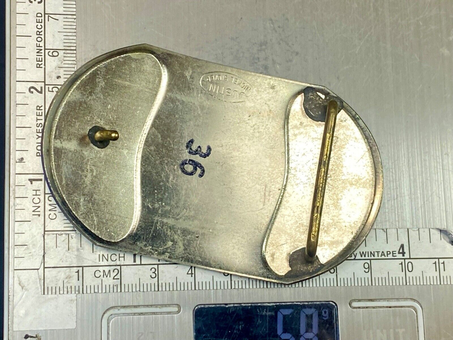 Vintage Justin Boot Co Maker Nickel Silver western belt buckle marked 36