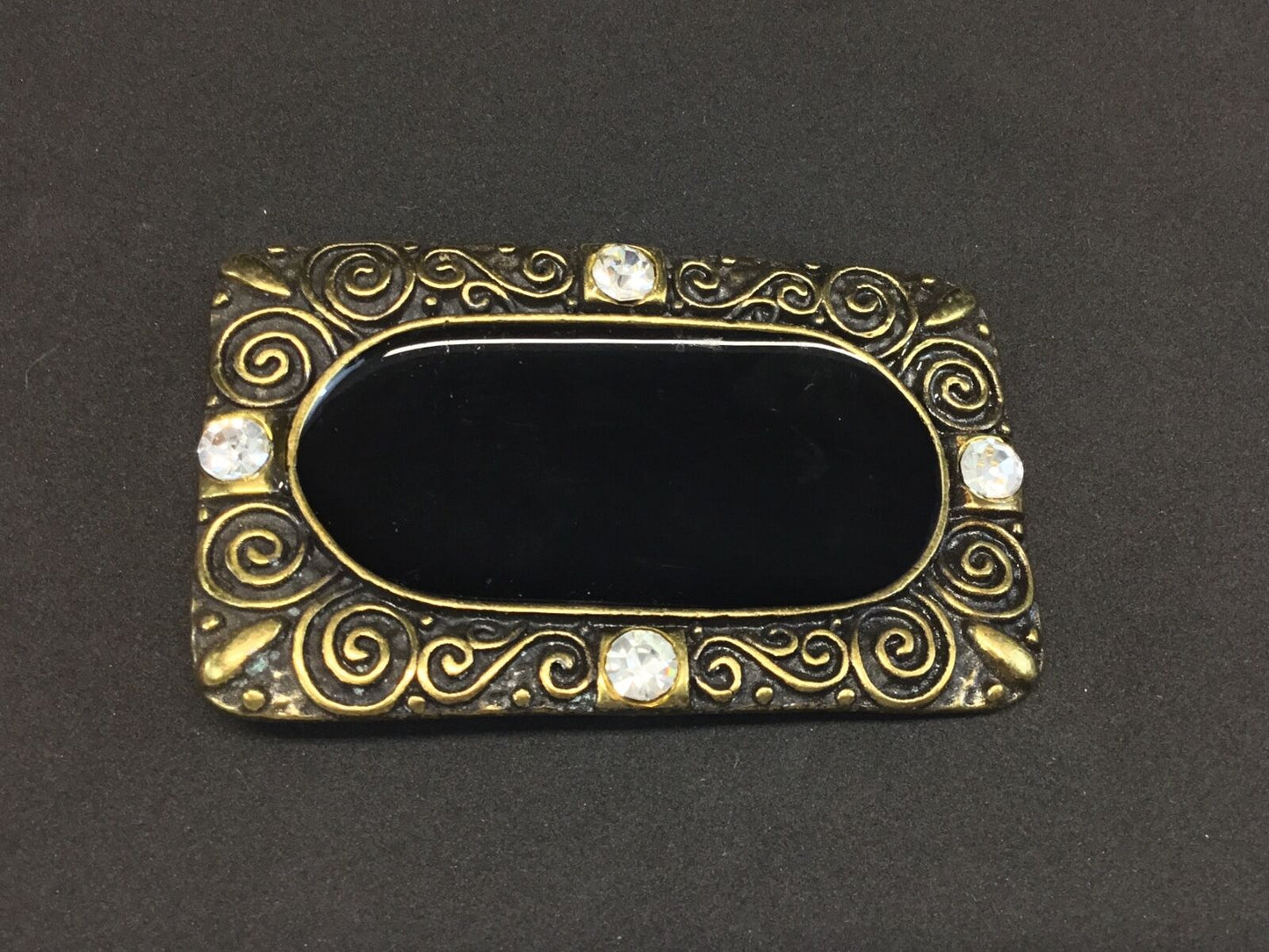 3.5". Designer / western / dress / Black and brass tone rhinestone belt buckle