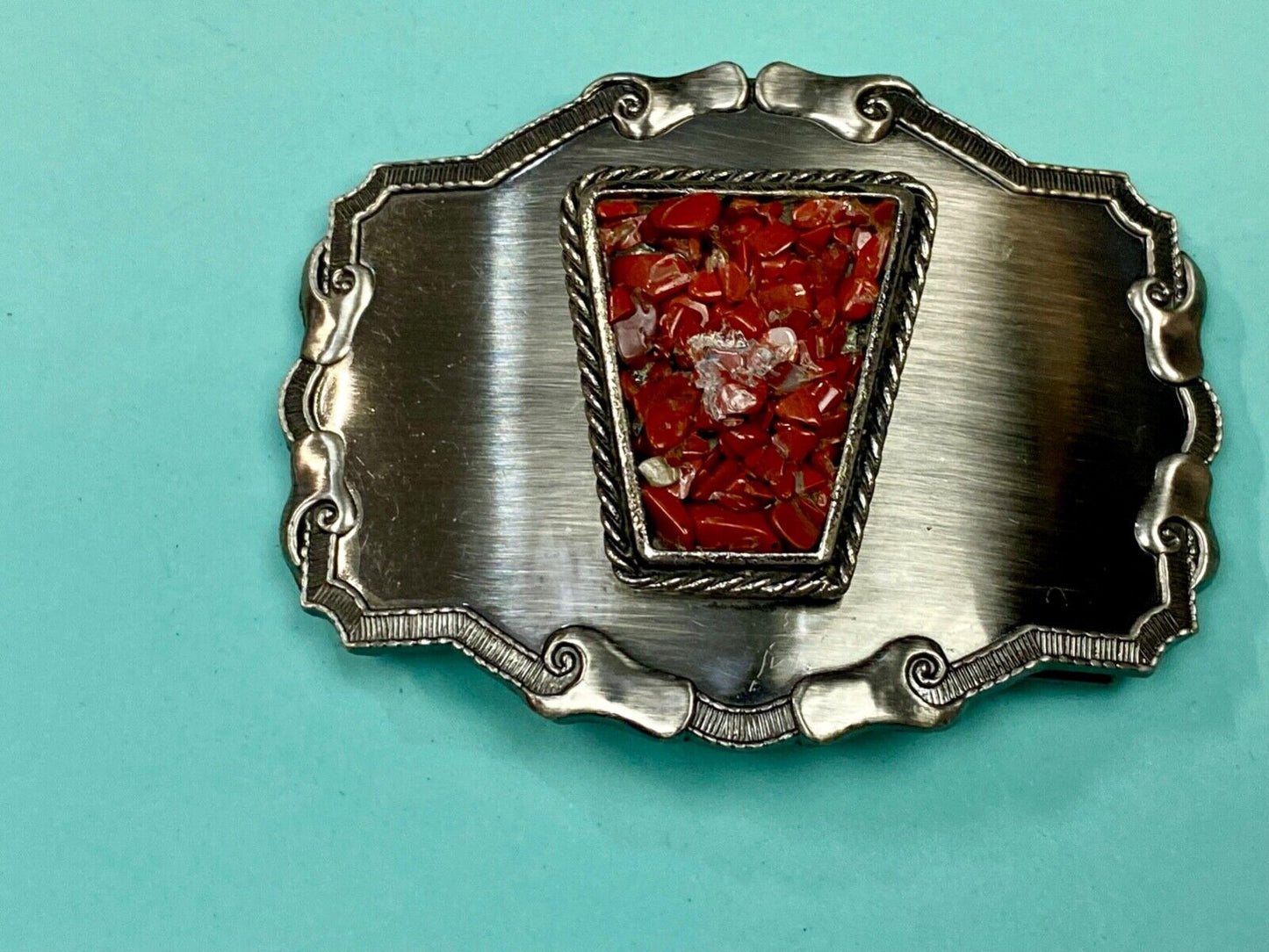 Vintage chunky red stones in centerpiece of Western Thick framed belt buckle