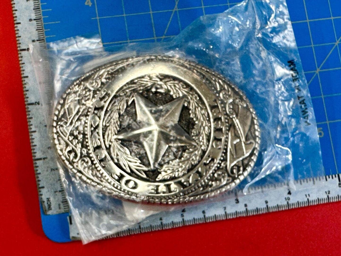 The Great State of Texas - Lone Star Flags seal silver tone NOS belt buckle