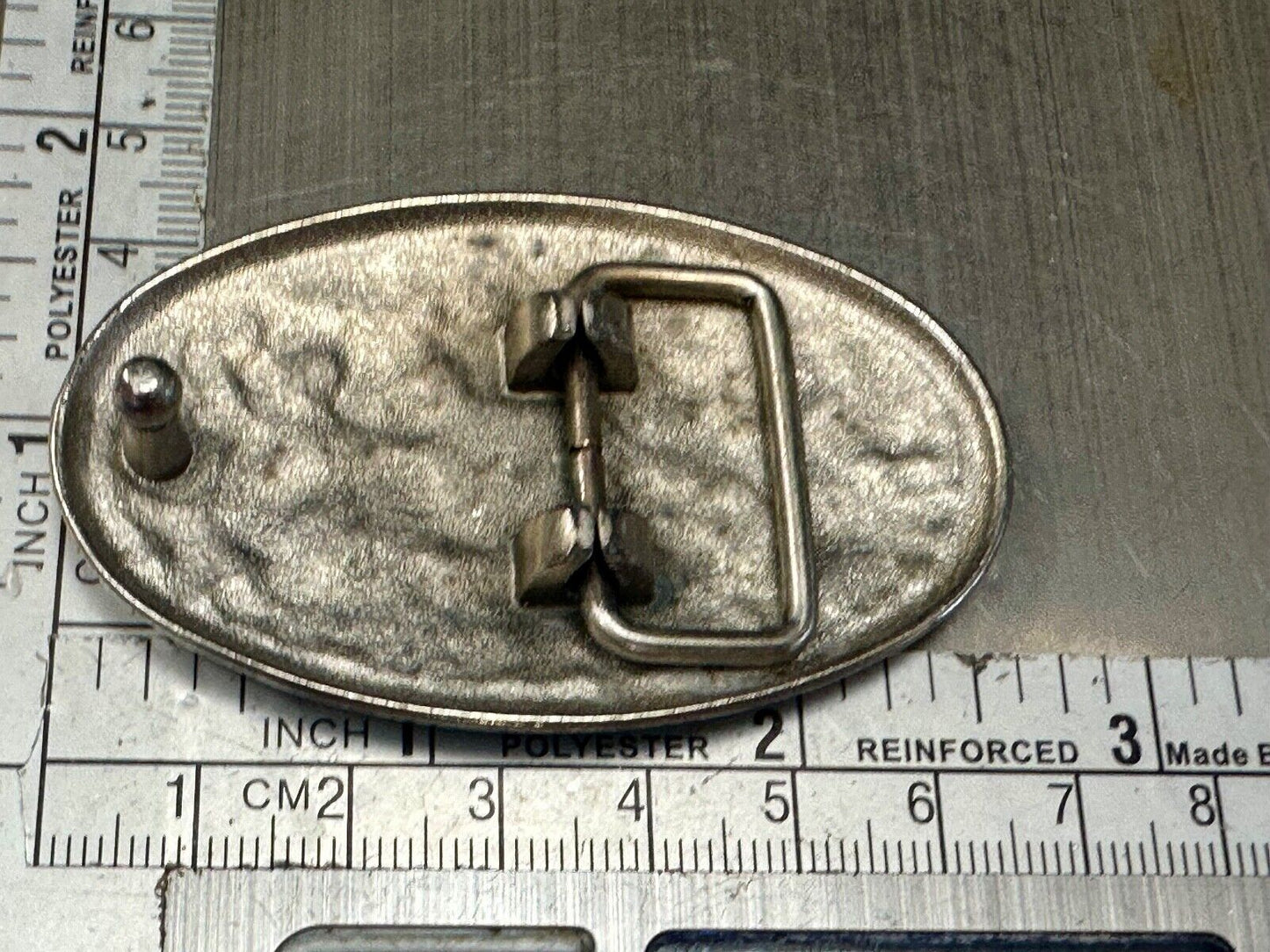 Vintage Cluster Centered in southwestern pattern oval belt buckle