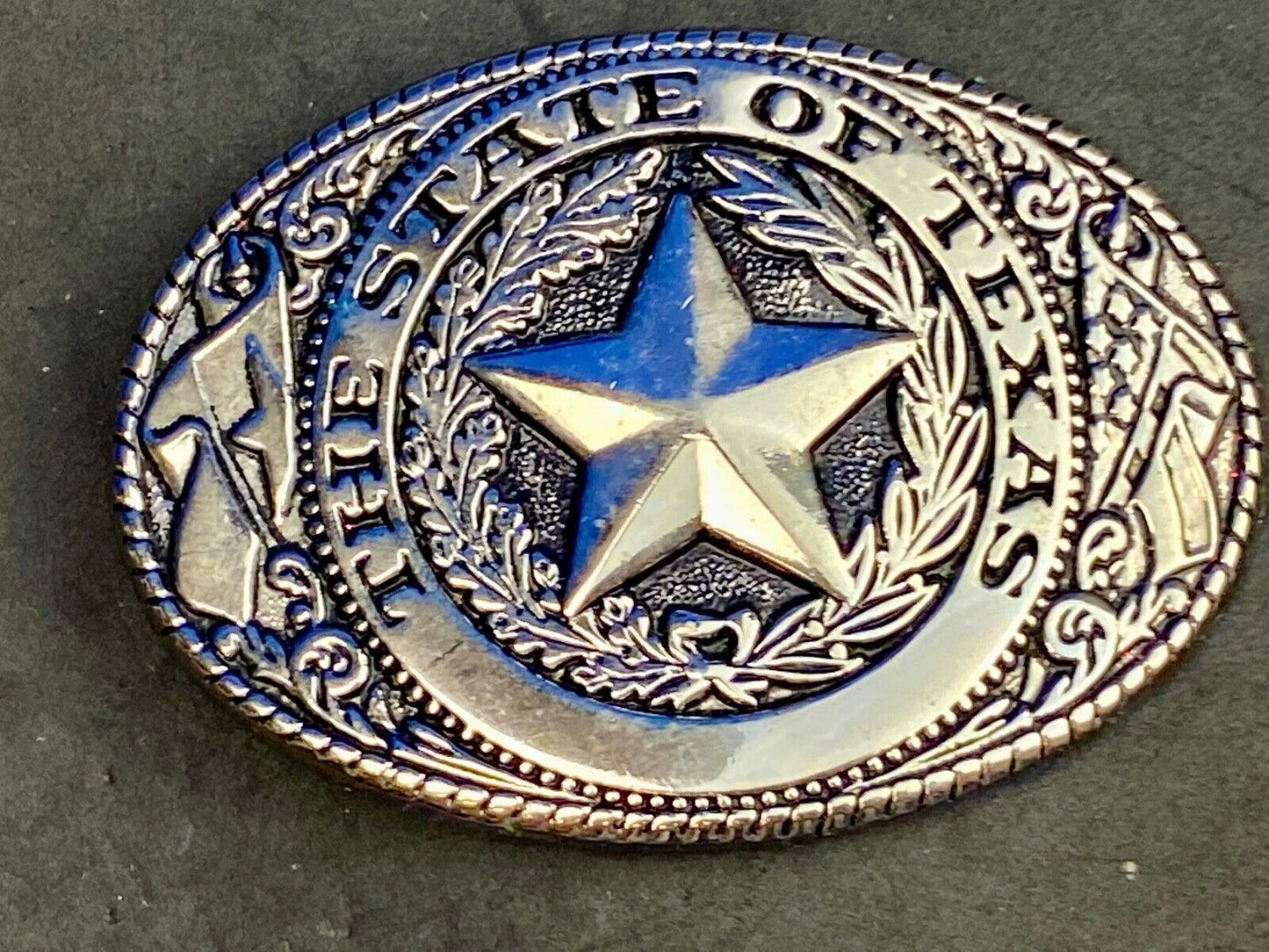 THE GREAT STATE OF TEXAS Star Black and Silver color flower swirl belt buckle