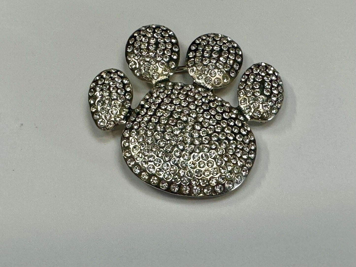 Bear Paw Print Silver Tone rhinestone covered belt buckle