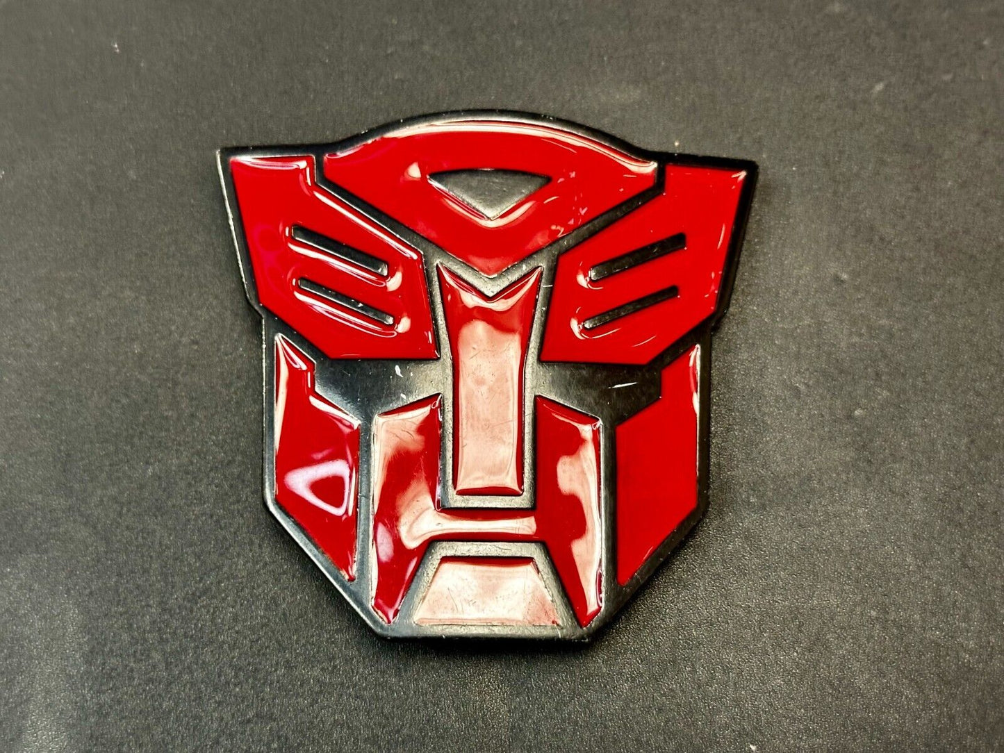 The Transformers Autobot More Than Meet The Eyes Symbol Red Cutout Belt Buckle