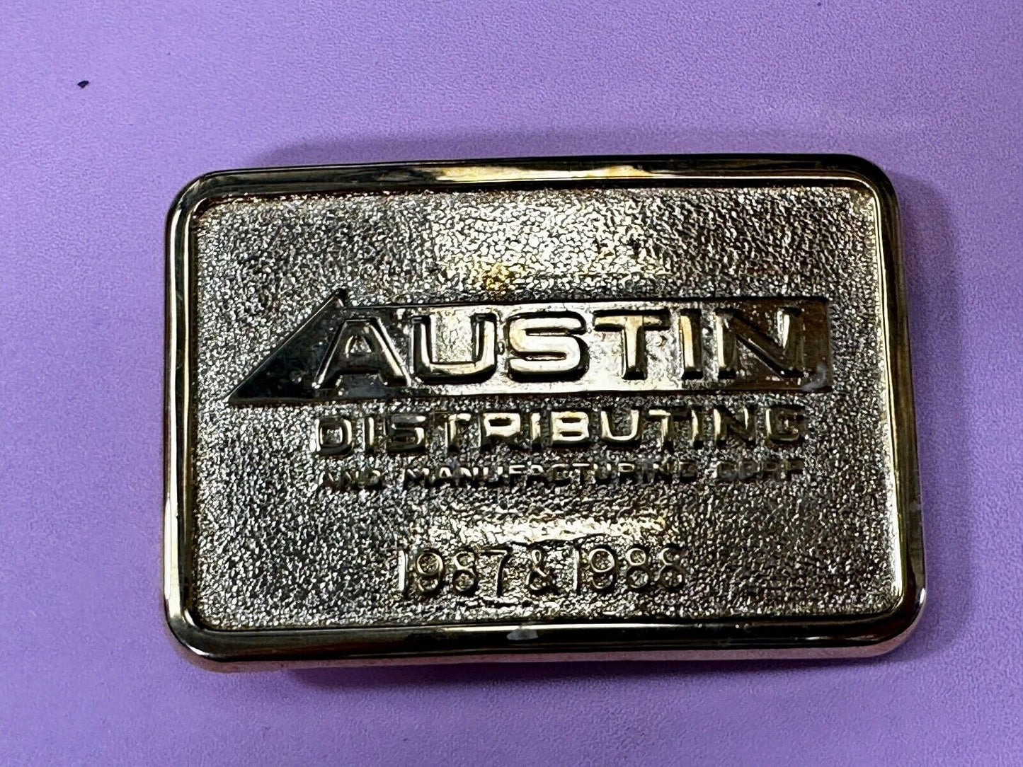 Austin Texas Distributing and Manufacturing 1987 Gold Tone Belt Buckle
