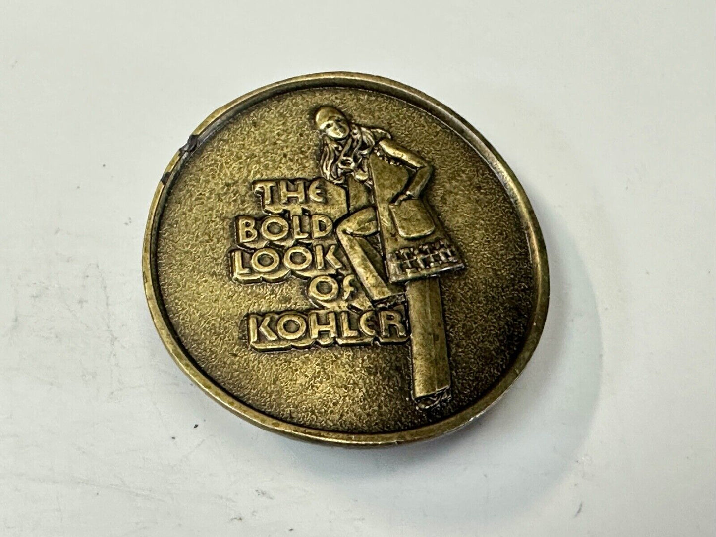 The Bold Look of Kohler Vintage 1977 Lewis round Limited Edition belt buckle