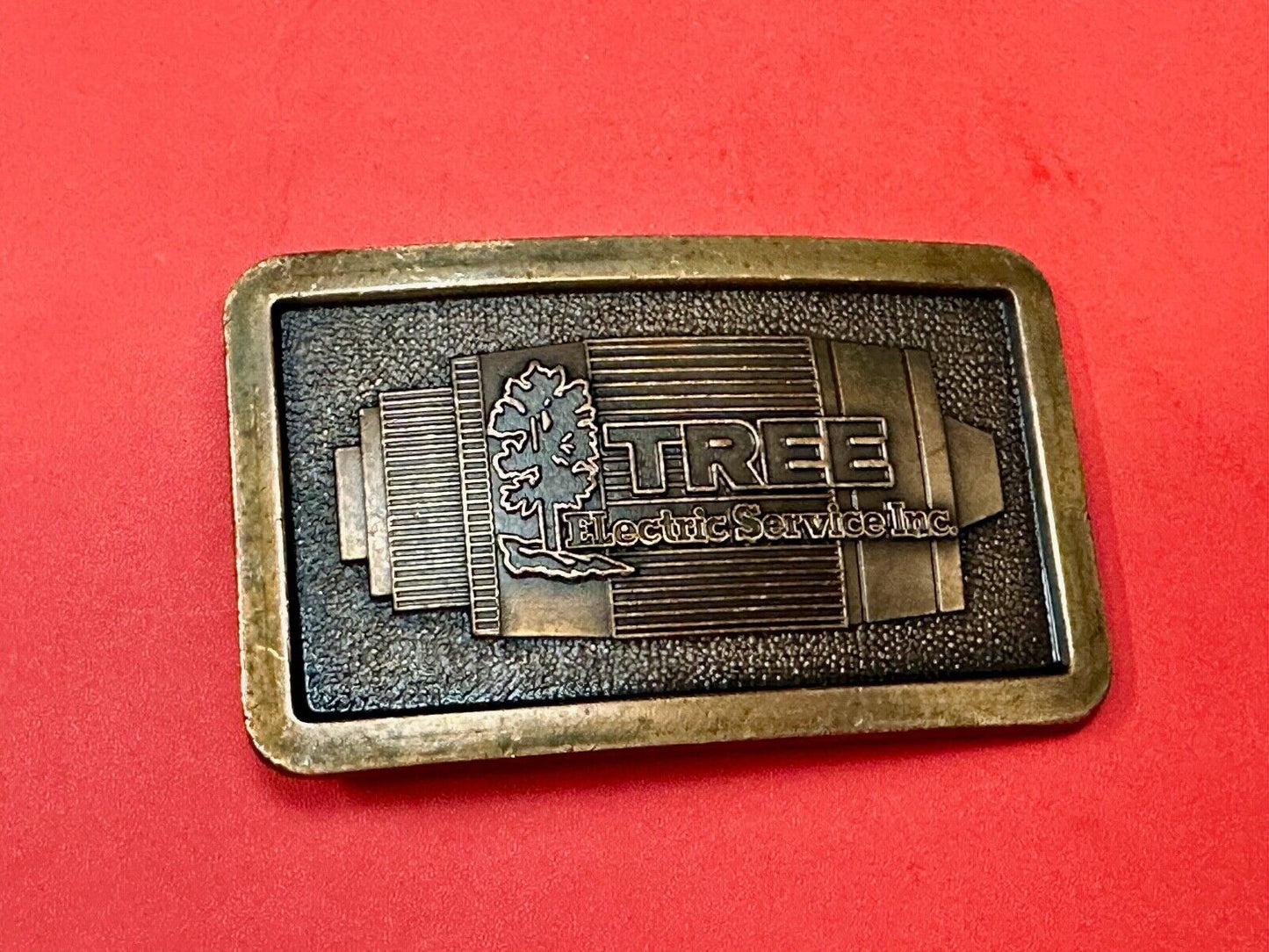 Tree electric service INC Vintage advertising promo brass tone Belt Buckle